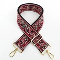 Detail of bohemian paisley embroidery on a wide black crossbody strap with gold buckles - Silver Clasp / No.8 Beige Red