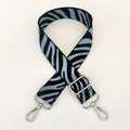 Detail of adjustable nylon camera bag strap with blue and black zebra pattern and metal hooks - Light Blue Silver