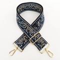 Close-up of bohemian paisley embroidery on a wide bag strap with gold metal buckles - No.15 Blue