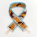 Detail of colorful camo wide webbing strap with adjustable shiny gold metal buckles - Silver Wire No.16