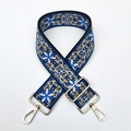 Close-up of wide ethnic embroidered bag strap with blue floral pattern and gold metal hooks - Silver Clasp / Royal Blue