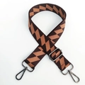 Macro shot of adjustable brown and orange geometric weave strap with silver metal hooks - Coffee with Gunmetal Buckle