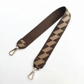 Close-up of brown geometric wide shoulder strap with gold-tone metal lobster clasps - Green Short