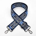 Close-up of ethnic floral embroidery on a wide bag strap with gunmetal lobster clasps - Royal Blue (Gunmetal Buckle)