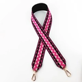 Close-up of bohemian pink and black geometric woven wide shoulder strap with gold clasps - Black Rose Pink