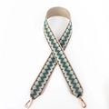 Detail of geometric wave woven bag strap in beige and blue with gold lobster clasps - Matcha Green
