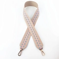 Close-up of pink and blue wave pattern woven bag strap with rose gold metal hooks - Light Pink