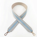 Detail of wide woven strap with blue and beige geometric pattern and gold swivel hooks - Light Blue
