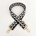 Detail of adjustable black and white geometric woven strap with gold metal lobster clasps - Black White With Gold Buckle