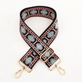 Close-up of ethnic jacquard purse strap with pink geometric patterns and gold metal hooks - L-Pink Blue