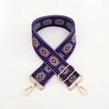 Close-up of purple jacquard ethnic bag strap with geometric patterns and gold metal hooks - L-Purple