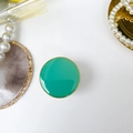 Detail of emerald green adhesive folding phone grip with elegant gold metal rim - Round Electroplated Stand / Macaron Green