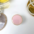 Detail of a pink glossy phone grip with a golden metal frame and a mirror-like finish - Round Electroplated Stand / Macaron Pink