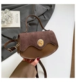 Detail of vintage brown shoulder bag showing suede and smooth leather texture contrast - Brown