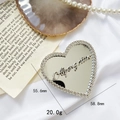 Silver heart-shaped mirror phone grip with Alpenglow text and rhinestone border - Heart-Silver A Mark