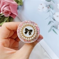 Rosa Glitzer-Handyhalterung mit Perlenrand, schwarzer Schleife und der Nummer Fünf - Rosa Perle Bogen