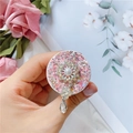 Rosa Glitzer-Handyhalterung mit Perlen, Strasssteinen und einem Tropfenanhänger - Rosa Sonnenblume