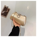Elegant gold evening clutch bag with sparkling diamond buckle and metal chain strap - Gold