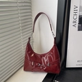 Retro dark red patent leather shoulder bag with glossy finish and silver metal accents - Red