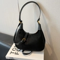Chic black suede hobo bag with adjustable leather strap and golden hardware accents - Black Without Charm