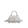Elegant light gray textured handbag with scalloped flap and gold logo on white background - Gray