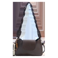 Brown faux leather underarm bag featuring a braided shoulder strap and beaded keychain - Coffee With Pendant