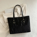 Minimalist black tote bag with pleated texture and golden rivet accents for daily commuting - No Pendant / Black
