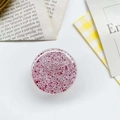 Detail view of round glitter phone socket with pink sequins and resin drip finish - Epoxy Gold Foil Round / Rose Red