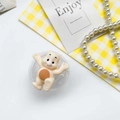 Cute bear phone grip with transparent base shown on a warm aesthetic background - Apricot