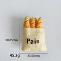Lustiger Baguette Handy-Griffhalter im Brot-Design aus Harz 60,85mm groß - Gelbe Tüte Brot Form