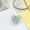 Heart-shaped clear phone socket with green foil flakes and glitter in a folded state - Drip Glue Foil Bracket-Heart-Green