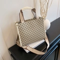 Sac fourre-tout en toile beige avec motif trèfle et finitions en cuir crème - Kaki