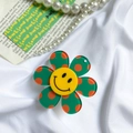 Support de téléphone fleur verte à pois avec centre smiley jaune sur soie - Support Souriant Fleur à Pois / Vert