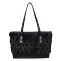 Fashionable black tote bag with plush textured top and smooth leather base for daily commute - Black