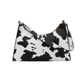 Bolso baguette chic con estampado de vaca en blanco y negro y detalles de aro dorado - Estampado de vaca