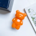 Cute 3D bright orange gummy bear retractable phone grip with transparent base - Macaron Bear Holder / Orange