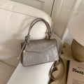 Minimalist taupe textured flap handbag with a knotted handle and adjustable shoulder strap - Khaki