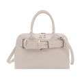 Creamy beige fashion handbag with decorative silver buckle and adjustable shoulder strap - White