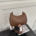 Dark brown crescent shoulder bag with unique knotted rope strap and gold metal accents - Brown No Pendant