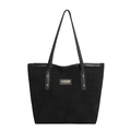 Bolso tote negro minimalista en gamuza mate con remaches dorados y detalle de logo - Negro