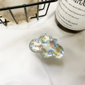Holographic cloud-shaped phone grip with iridescent finish on white fabric background - Silver Laser Cloud