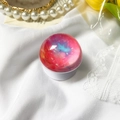 Macro view of a planet-themed retractable phone grip with a glossy nebula pattern - Crystal Ball Holder - Starry Sky - Red