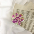 Iridescent purple 3D cat paw phone grip with heart detail on vintage book aesthetic - Cat Paw Holder-Colorful Laser