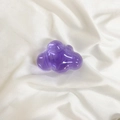 Purple translucent cloud-shaped resin phone socket grip on white fabric background - Transparent Cloud Holder - Purple