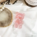 Süße rosa Bären-Handyhalterung mit transparenter Jelly-Textur auf weißem Stoff - Lichtdurchlässiges Rot