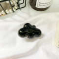 Minimalist black cloud phone socket with glossy finish and white retractable base - Black