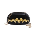 Pebble-shaped black leather clutch featuring an artistic gold fluid wave metal detail - Black