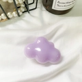Minimalist purple cloud phone grip with glossy finish on white fabric background - Purple