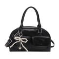 Fashionable black faux oil-wax leather bowling bag with pearl bow charm and shoulder strap - Black