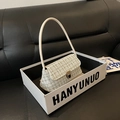 Pale green tweed handbag with white handle and gold clasp in minimalist square design - Off White